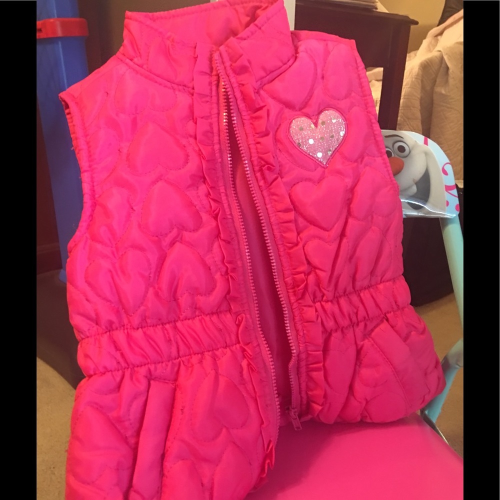 Got pink vest, worn a few times. No tears.